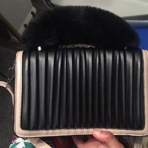 Cute light brown back with furry handle